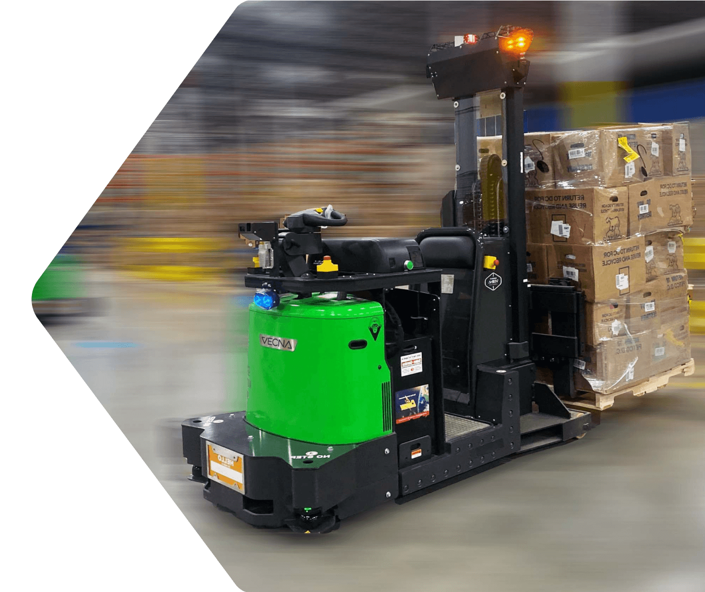 A photo of an autonomous forklift carrying a pallet of boxes